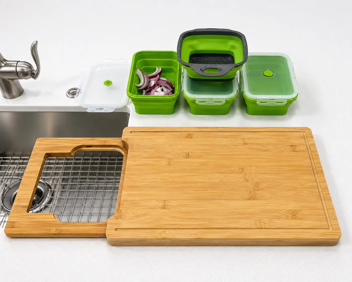 Bamboo cutting board with strainer compartment used to prepare vegetables over a sink